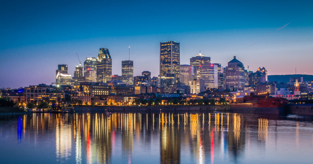 Montreal’s skyline at sunset, reflecting the vibrant climate tech scene Alder discussed in their exploration of Canadian innovation.